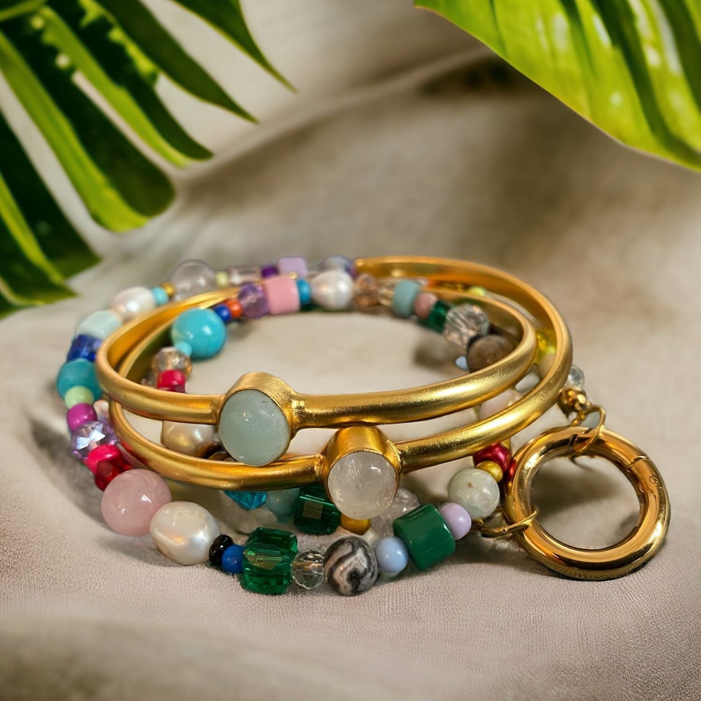 Gold and multicolored gemstone and glass bead necklace and bracelet set with freshwater pearls and a gold clasp