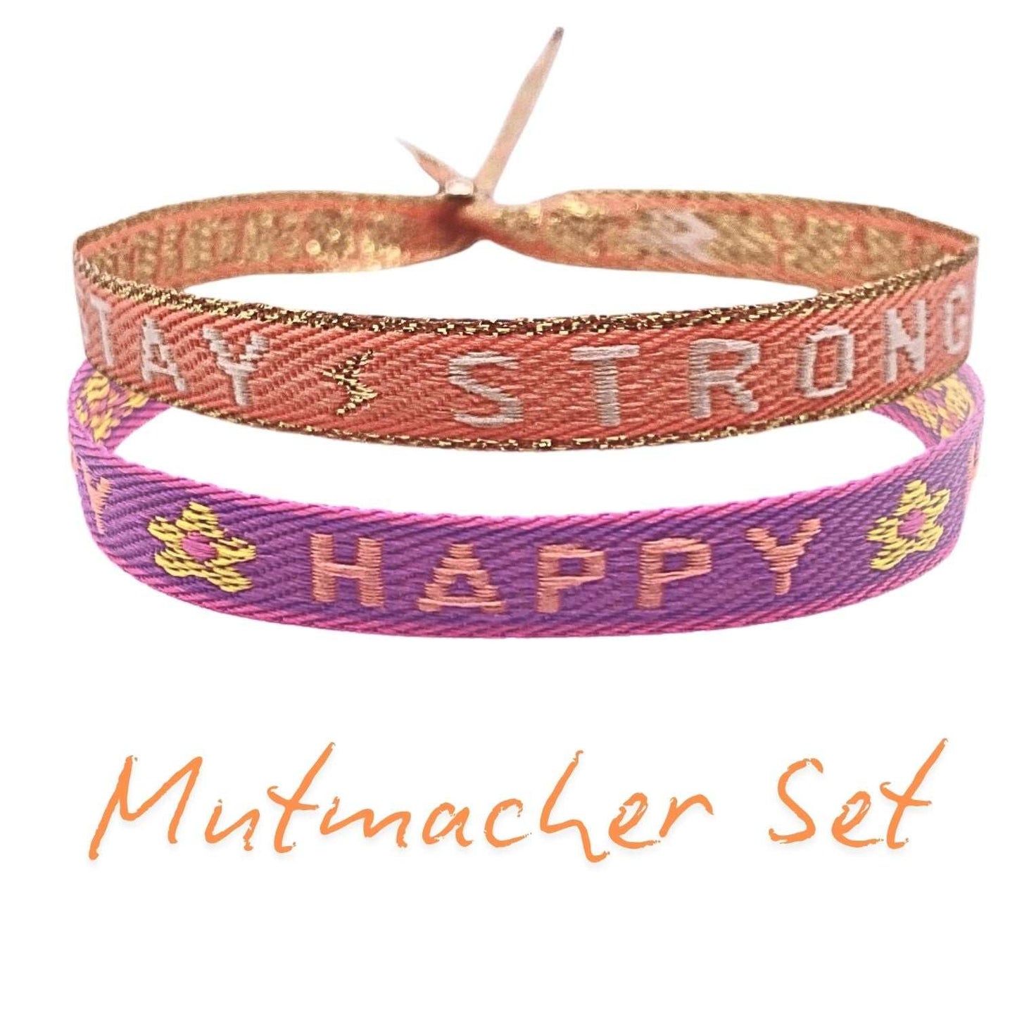 Statement Armbänder Set in Orange und Lila mit Spruch „Stay Strong“ und „Happy“.
