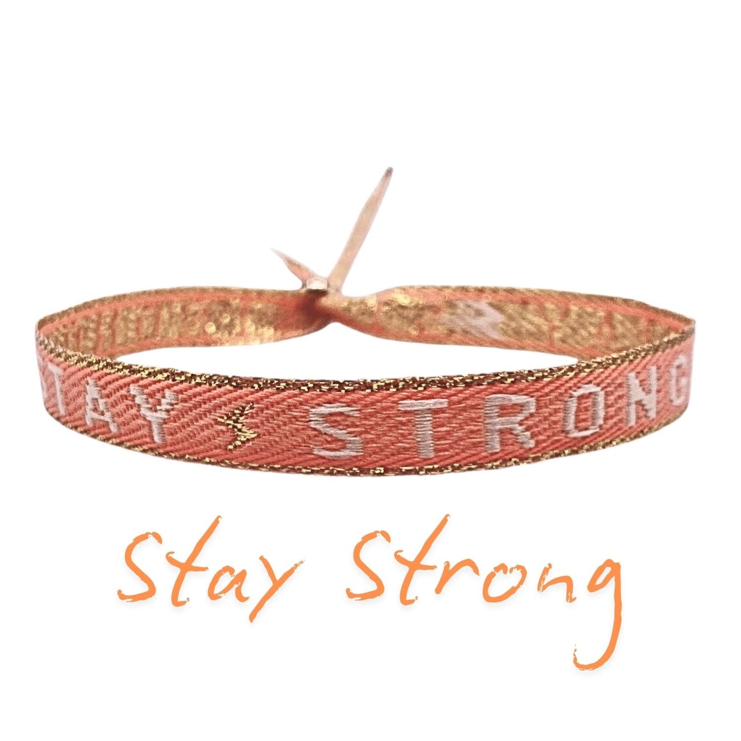 Statement Armband „Stay Strong“ in Orange mit verstellbarer Schiebeperle, inspiriert von Stärke und Durchhaltevermögen.