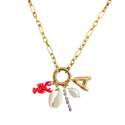 Charm Kette aus vergoldetem Edelstahl mit Karabiner und unterschiedlichen Anhängern.