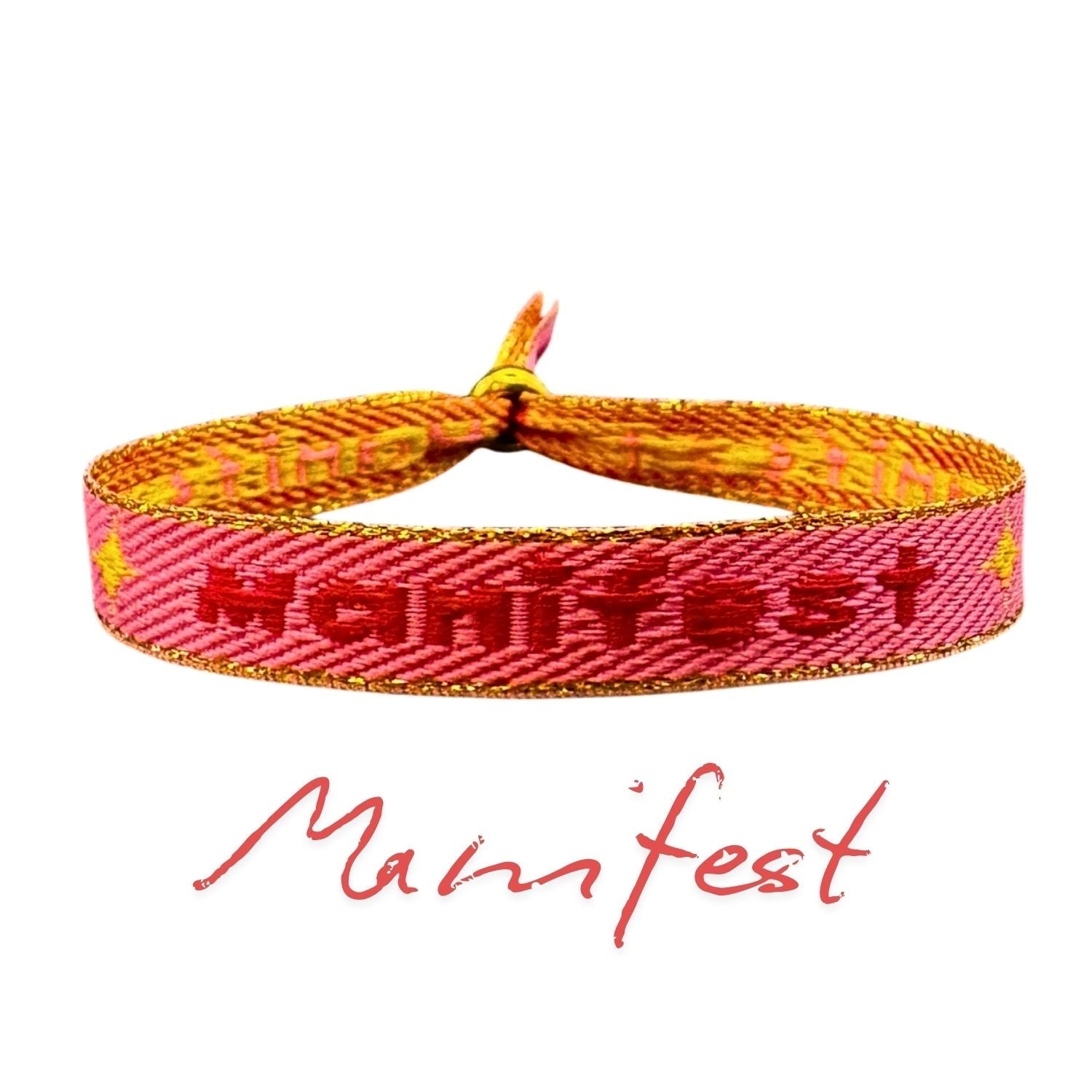 Statement Armband Manifest aus Stoff in Pink und Gelb mit Schriftzug "Manifest", ideal für positive Intentionen und Wasserfestigkeit.