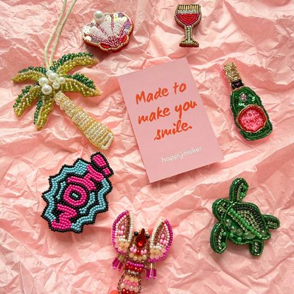 Brosche aus Perlen - Roséflasche