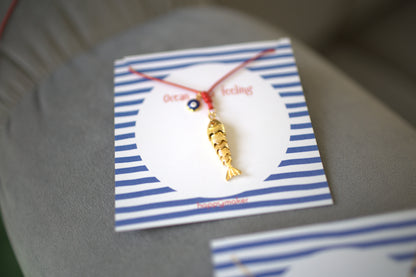 Kette mit beweglichen Fisch Anhänger gold