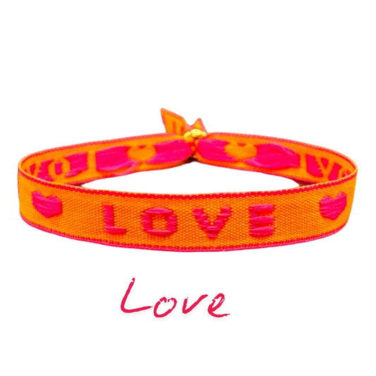 happymaker Stoffarmband neon orange mit Statement - Love